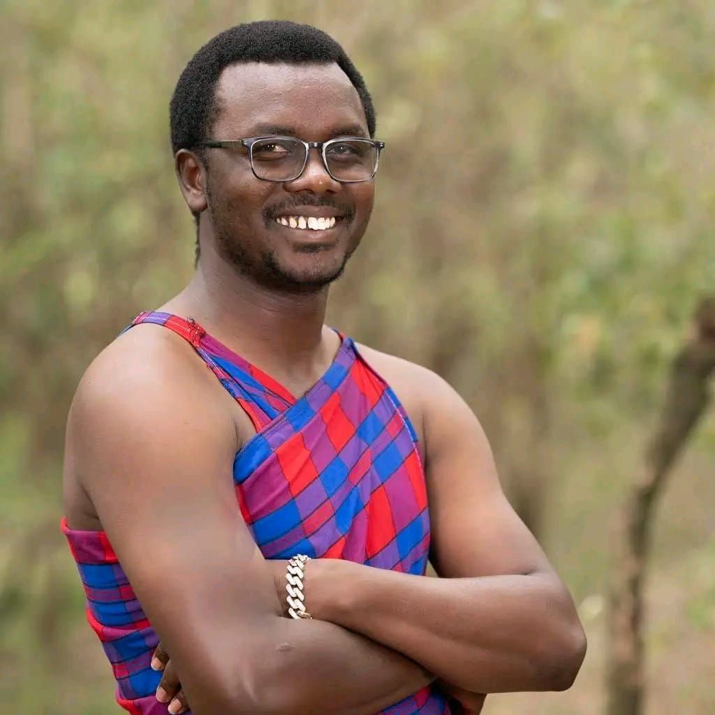 Sylvester in a blue and red Maasai shuka